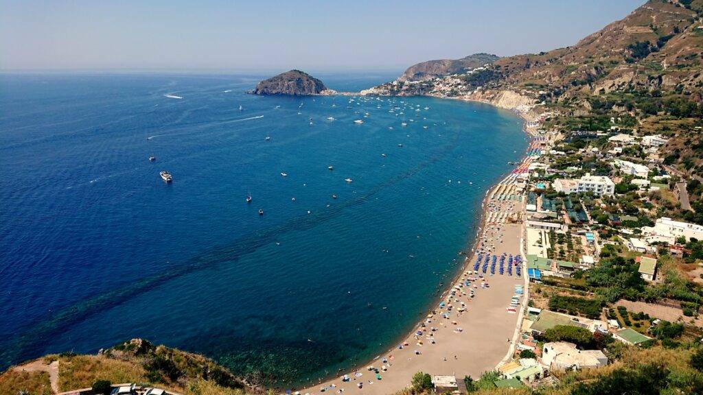 A birds eye view of a beach in Ischia, Italy